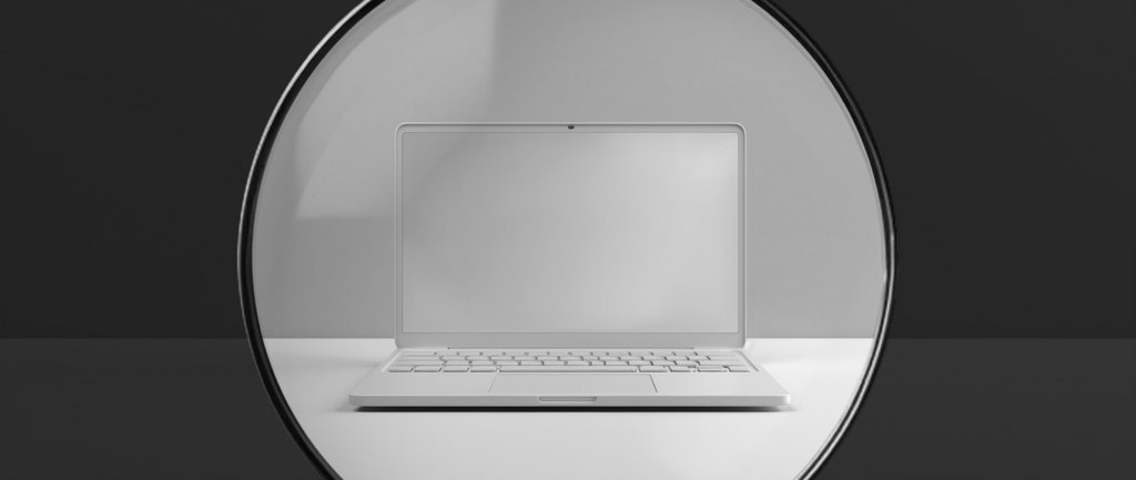 a black and white photo of an open laptop: black hat seo