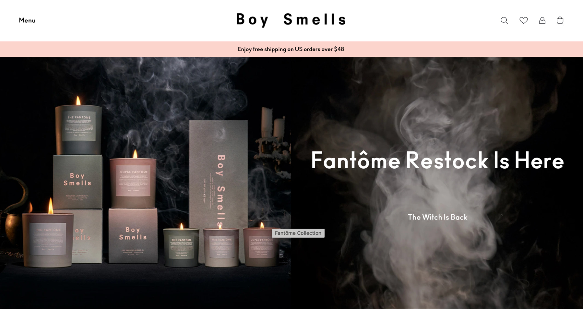 An arrangement of scented candles and candle boxes in muted colors on a black background.