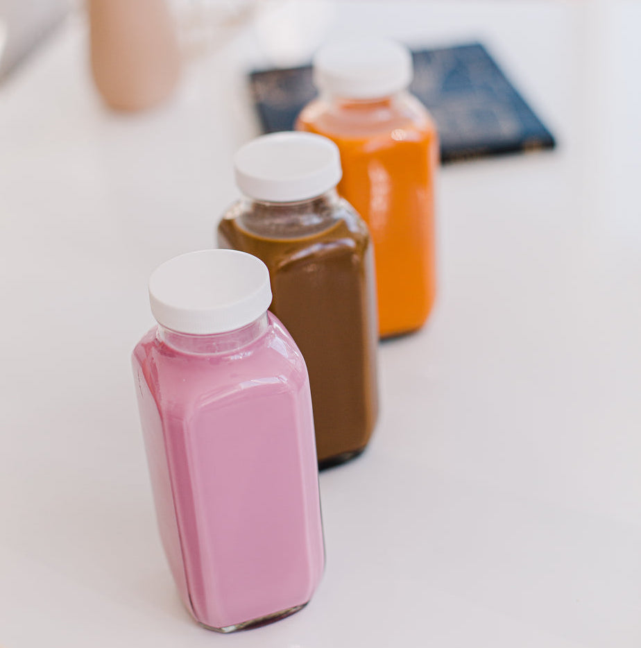 Three filled jars on table