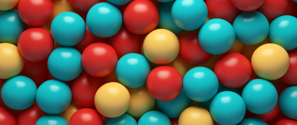 close-up shot of gumballs in a gumball machine: google search volume