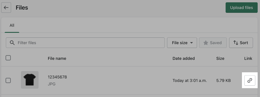 在Shopify管理文件页面中，链接按钮高亮显示在黑色t恤图像的一行中。gydF4y2Ba